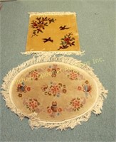 TWO CHINESE OVAL AND RECTANGULAR WOOL RUGS