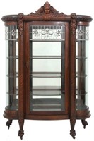 Carved Oak Bow Front China Cabinet