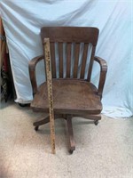 > Antique oak wood Murphy rolling office chair