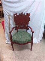 Decorative antique chair with padded seat