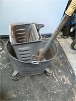 Metal mop bucket with castor wheels