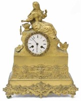 CONTINENTAL GILT METAL SPINNING WOMAN MANTEL CLOCK