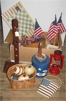 Box of patriotic items including flags, metal