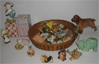 Large variety of figurines including dogs, lion,