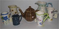 Vintage glassware items including brown tea pot,