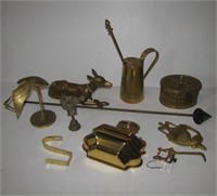 Brass items including candle snuffer, wall