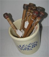 Ceramic crock with (8) Antique wood bobbins.