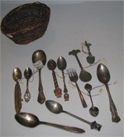 Small wicker basket with (12) Collector spoons
