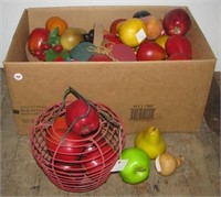 Large box of artificial fruit.