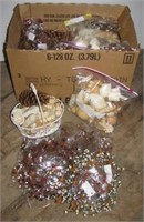 Large box full of decorative shells, potpourri,