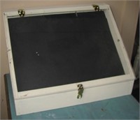 Wood display case with hinged Plexiglas top.