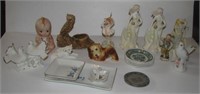 (12) Various figurines including baby powder