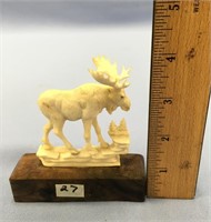 3" moose antler carving of a bull moose mounted on