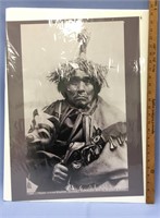 Shrink wrapped poster picture of a Takou Indian do