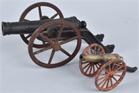 2- CAST IRON TOY CANNONS