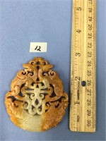 Carved stone pendant              (332)