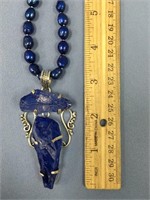 Died pearl crystal pendant with a blue bead neckla