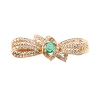 An Emerald and Diamond Brooch in 18K Gold