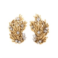 A Lady's Pair of Diamond Earrings in 18K Gold