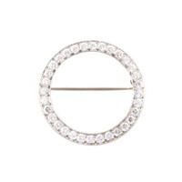 A Platinum Diamond Circle Pin by JE Caldwell