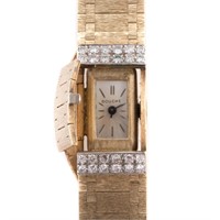 A Lady's 14K & Diamond Wrist Watch by Bouche
