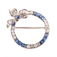An Art Deco Sapphire & Diamond Open Bow Brooch