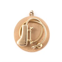 A Solid 14K Engraved Disc Pendant/Charm