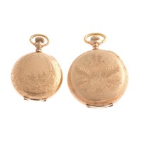 A Pair of Engraved Pocket Watch Cases