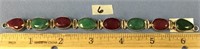 A fossilized ruby and emerald bracelet approx. 6.2