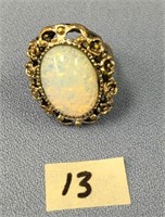 A faux opal ring, costume jewelry marked Park Lane