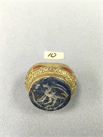 A large cloisonné ring with a large lapis stone
