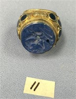A large cloisonné ring with a large lapis stone