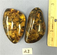 Lot of two 2.5" pieces of amber with various