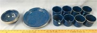 Large lot of blue enamel camping dishes and mugs