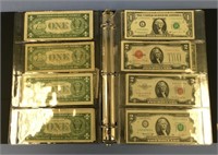 Binder of 21 blue seal $1 bills, 2 green seal $1 b
