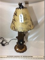 Wood table lamp with carved bear designs