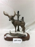 Whitetail buck woodcarving