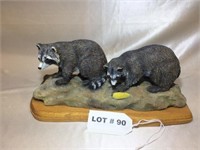 Woodcarving of 2 racoons