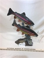 Woodcarving of a pair of rainbow trout