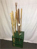 7 walking sticks and stand (ALL TO GO 1 MONEY)
