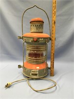 An old electric lantern marked: Ahiemann Schlatter