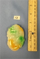 Piece of carved jade              (332)