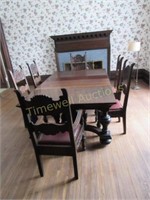 Dining table and 8 carved lion's head chairs