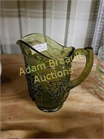 Embossed grape pattern water pitcher