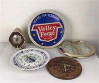 Vintage wall clocks and beer sign