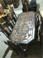 Overly carved table with 8 chairs