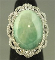 28.48 CT. EMERALD & 2.04 CT. COLORLESS SAPP. RING
