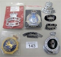 Eight Australian Police obsolete cap badges