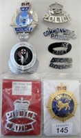 Eight Australian Police cap badges