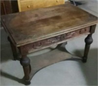 carved oak table with drawer